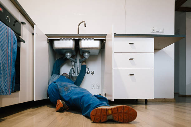 Professional Emergency Plumber technician working in Fruitland, IA
